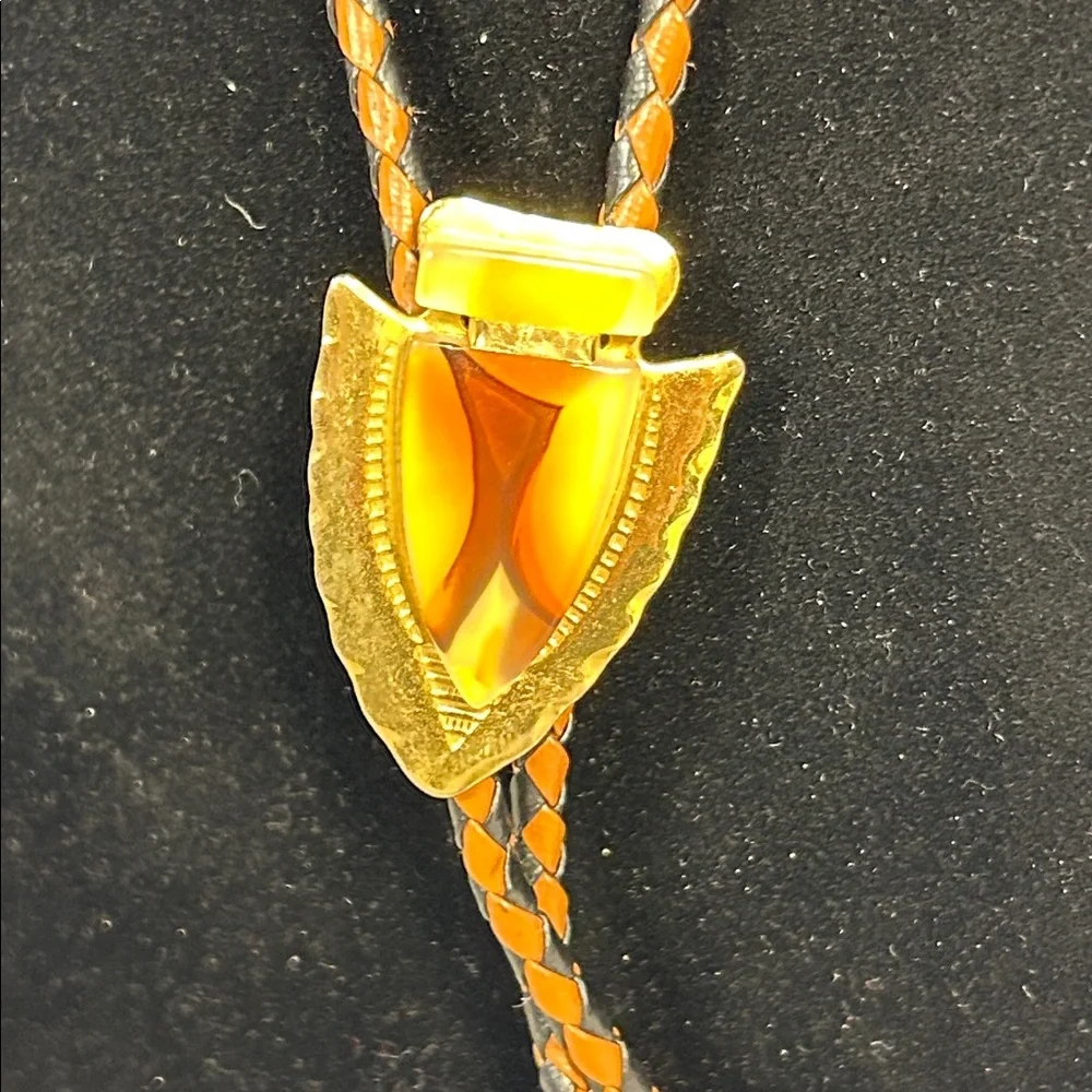 Vintage Bolo tie western leather and ornate medallion with bullet ends